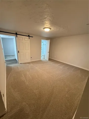 an empty room with a natural light