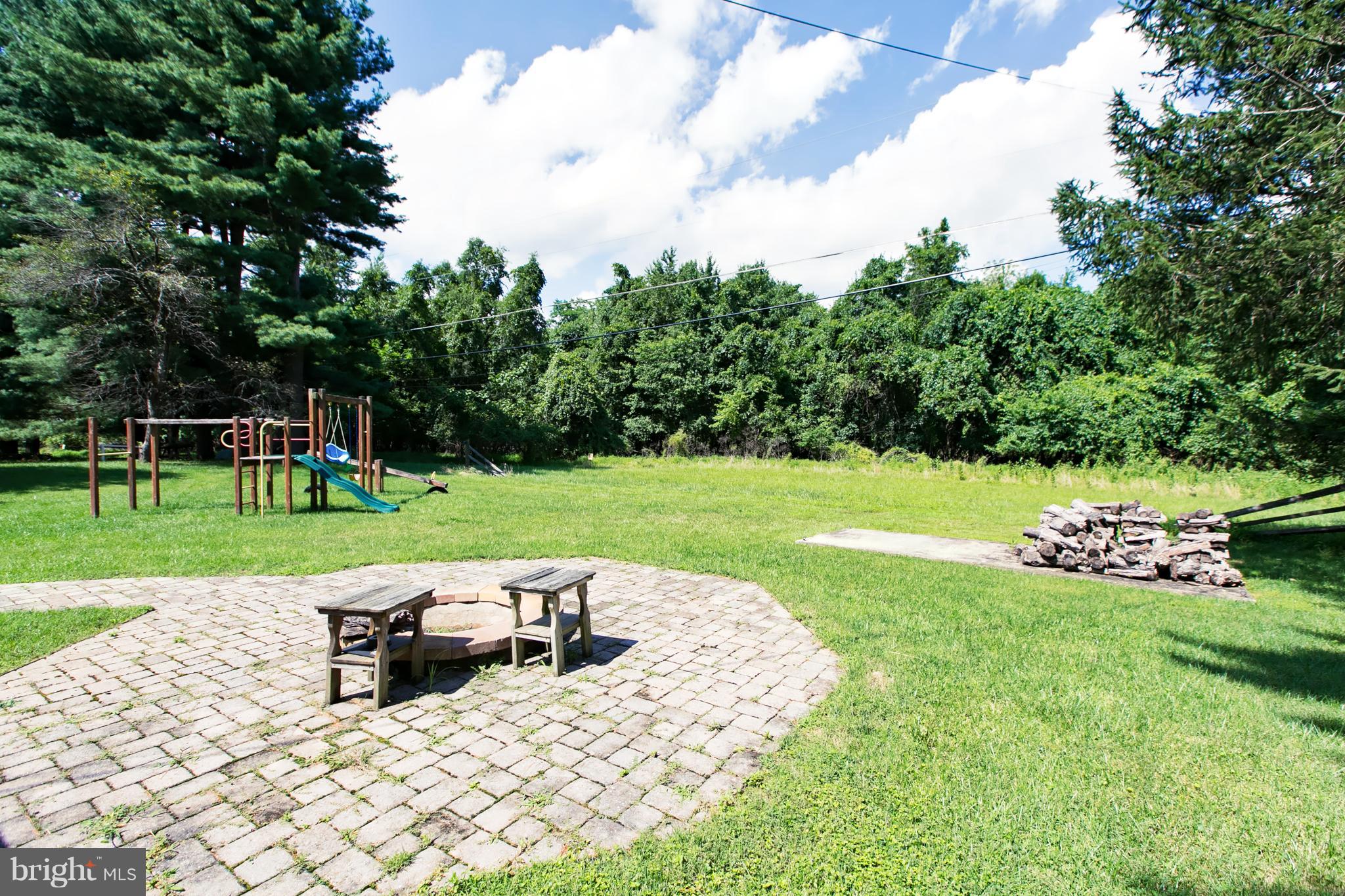 4624 Hawksbury Road Baltimore, MD 21208 - Photo 21 of 22 Fire pit in extra large rear yard, a must see!