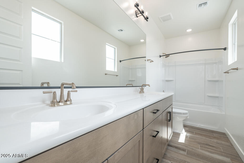 1342 East Prescott Street Gilbert, AZ 85298 - Photo 13 of 21 a bathroom with a sink a toilet and shower