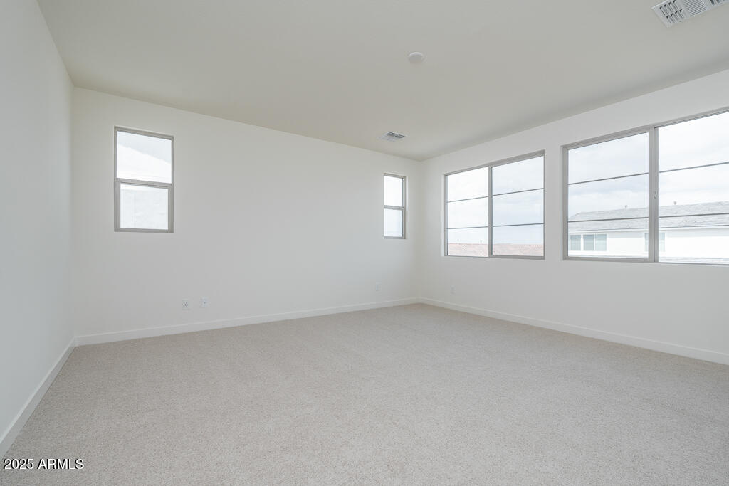 1342 East Prescott Street Gilbert, AZ 85298 - Photo 9 of 21 an empty room with windows