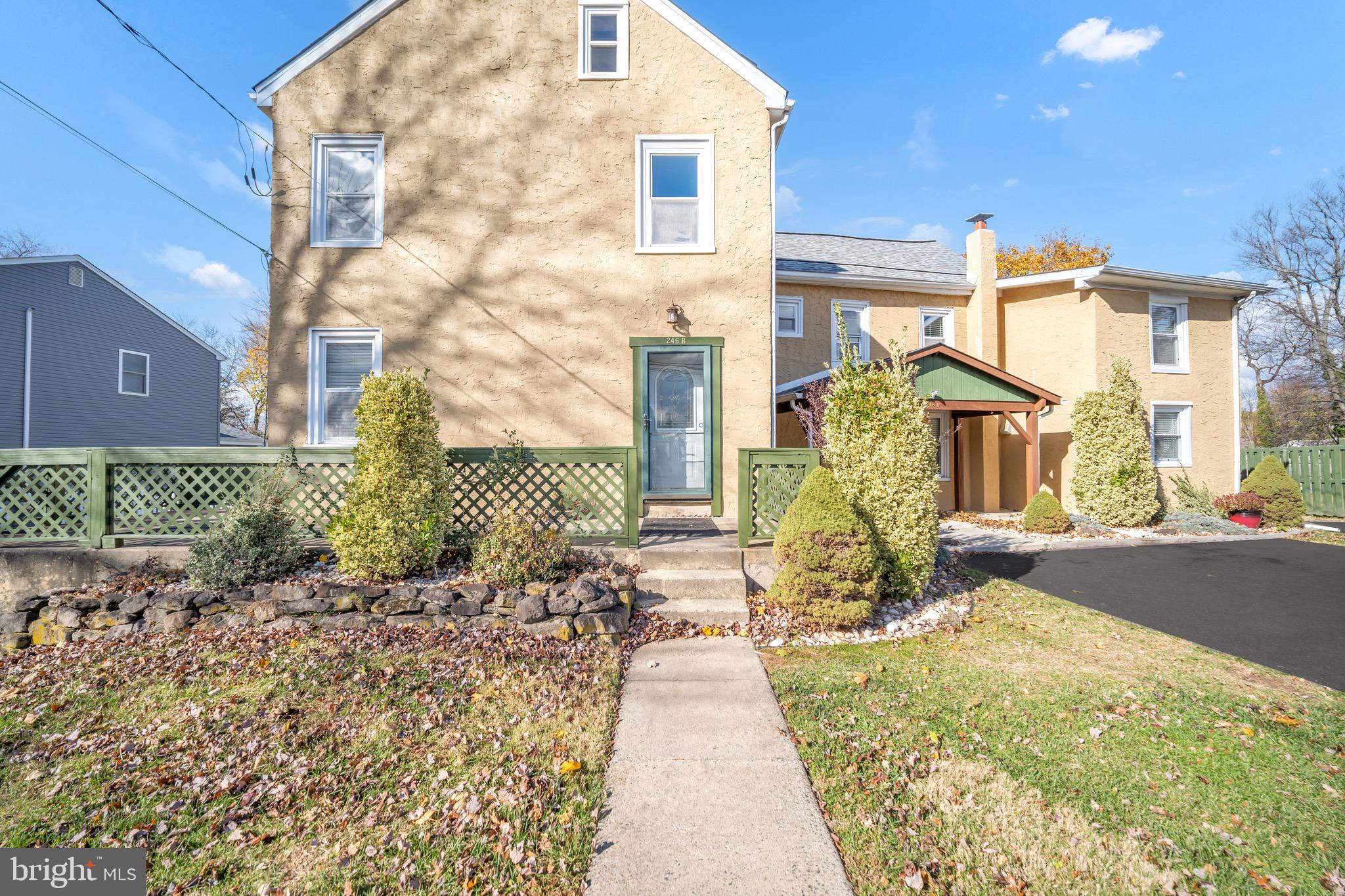 246 Cottage Avenue, Unit B Horsham, PA 19044 - Photo 1 of 19 a view of a brick house with many windows
