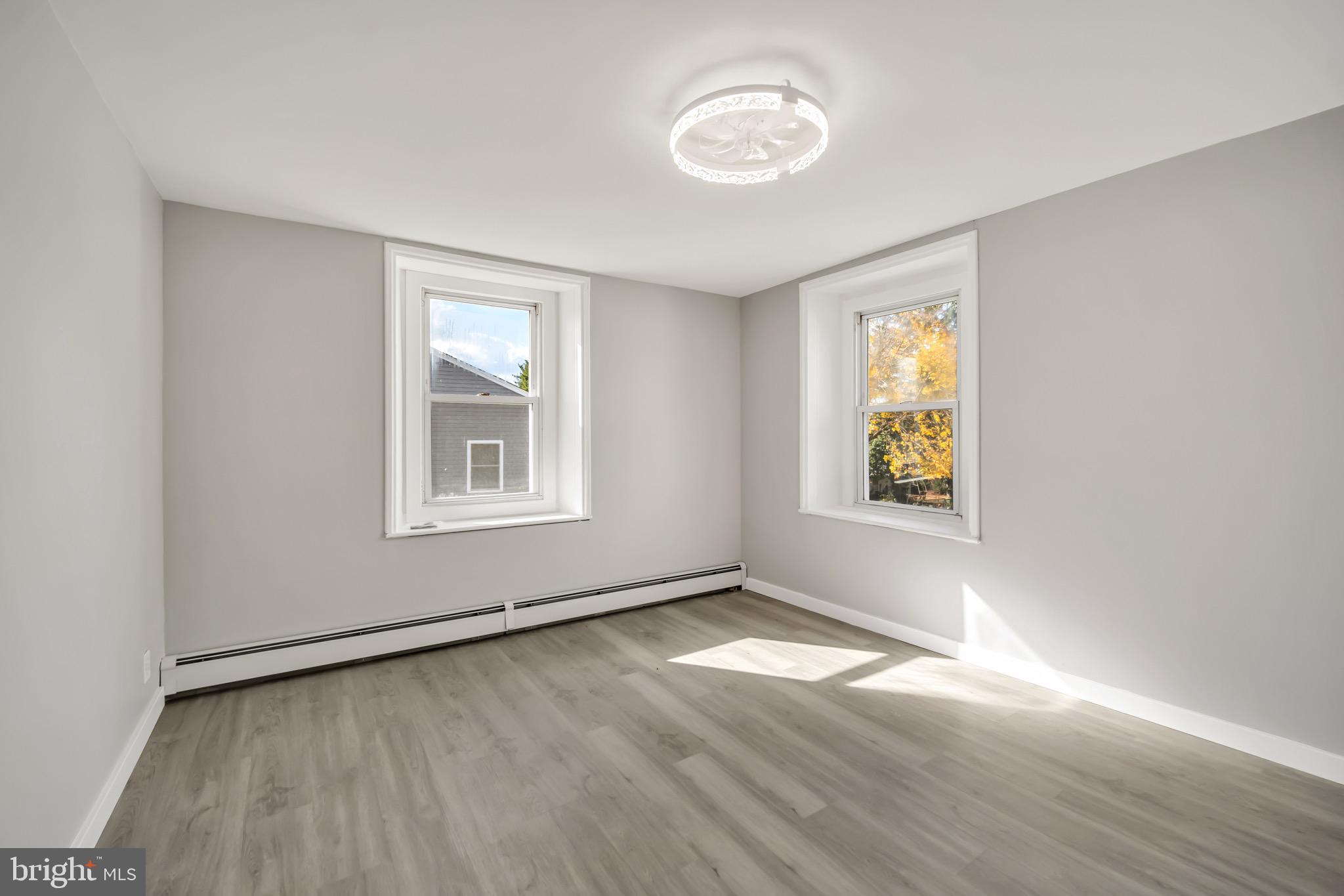 246 Cottage Avenue, Unit B Horsham, PA 19044 - Photo 13 of 19 an empty room with windows