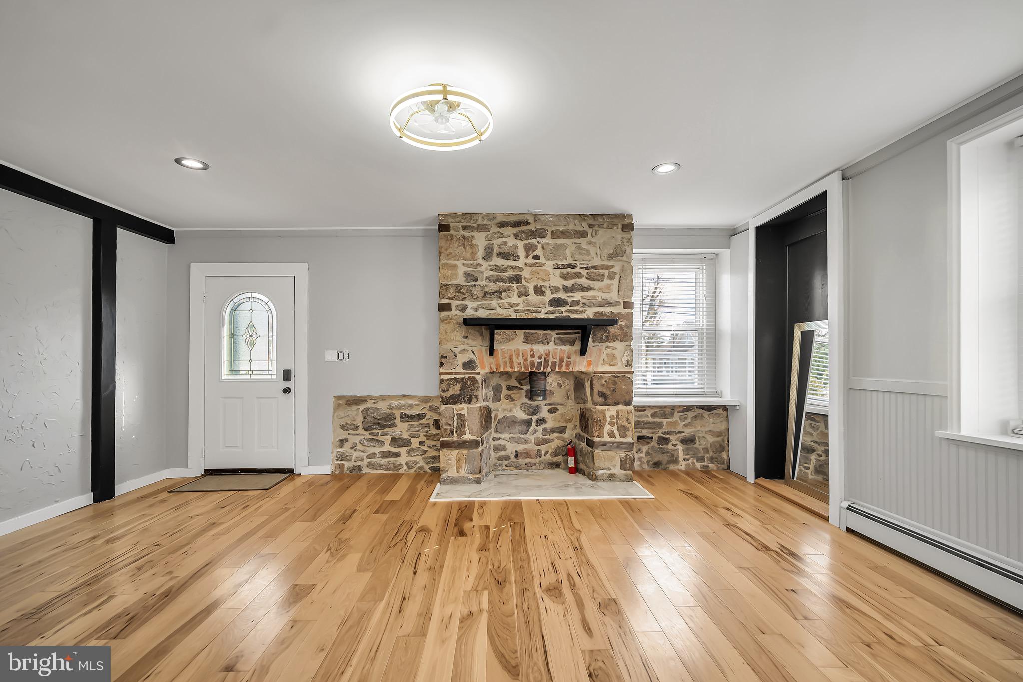 246 Cottage Avenue, Unit B Horsham, PA 19044 - Photo 4 of 19 a view of kitchen with furniture and wooden floor