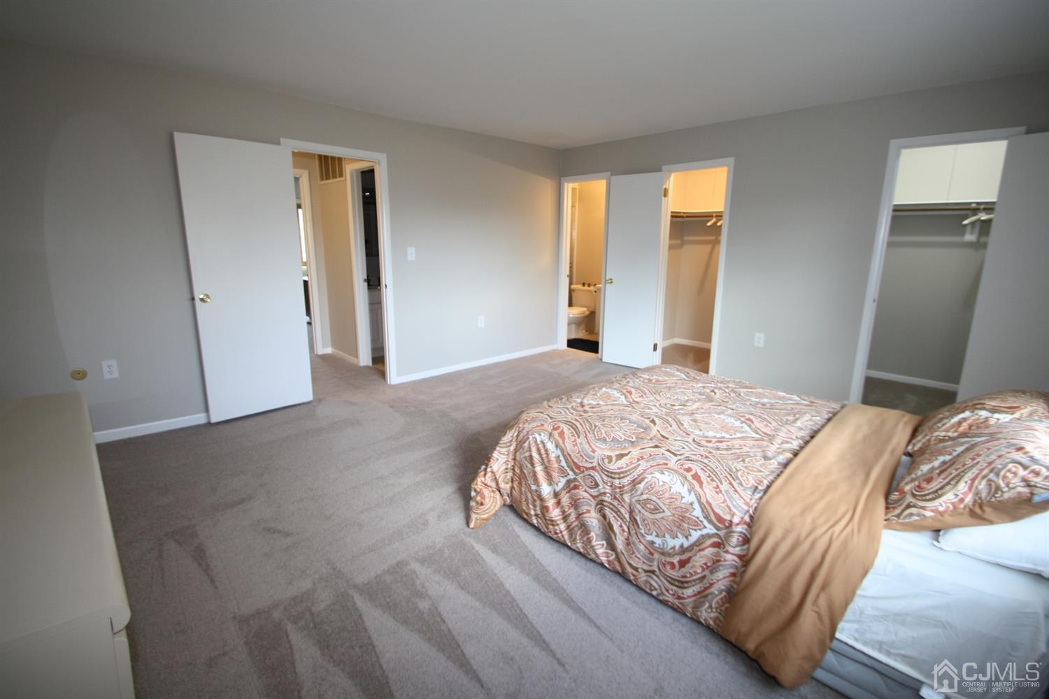 812 Robin Road Hillsborough, NJ 08844 - Photo 11 of 23 a bedroom with a bed and large window