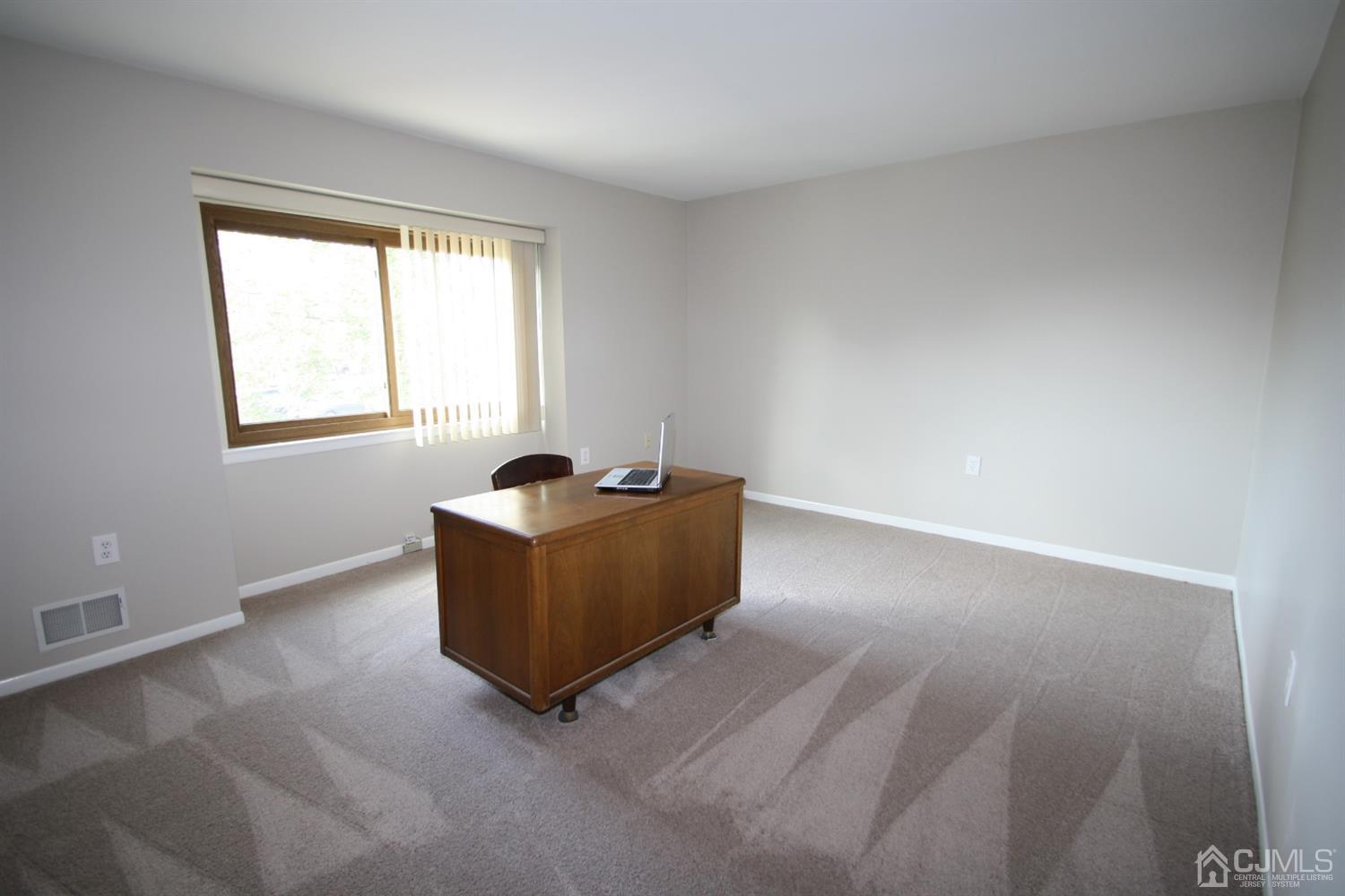 812 Robin Road Hillsborough, NJ 08844 - Photo 14 of 23 an empty room with a window
