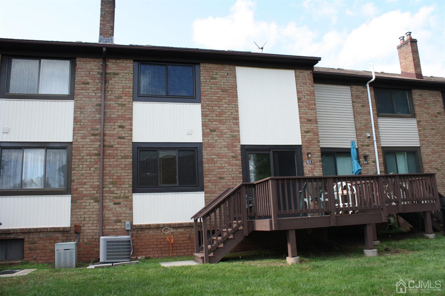 812 Robin Road Hillsborough, NJ 08844 - Photo 20 of 23 a view of house with yard street and wooden fence