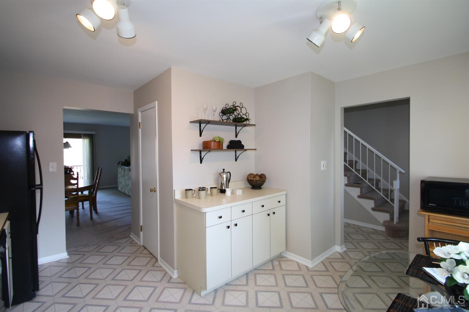 812 Robin Road Hillsborough, NJ 08844 - Photo 6 of 23 a view of a livingroom with furniture and a chandelier