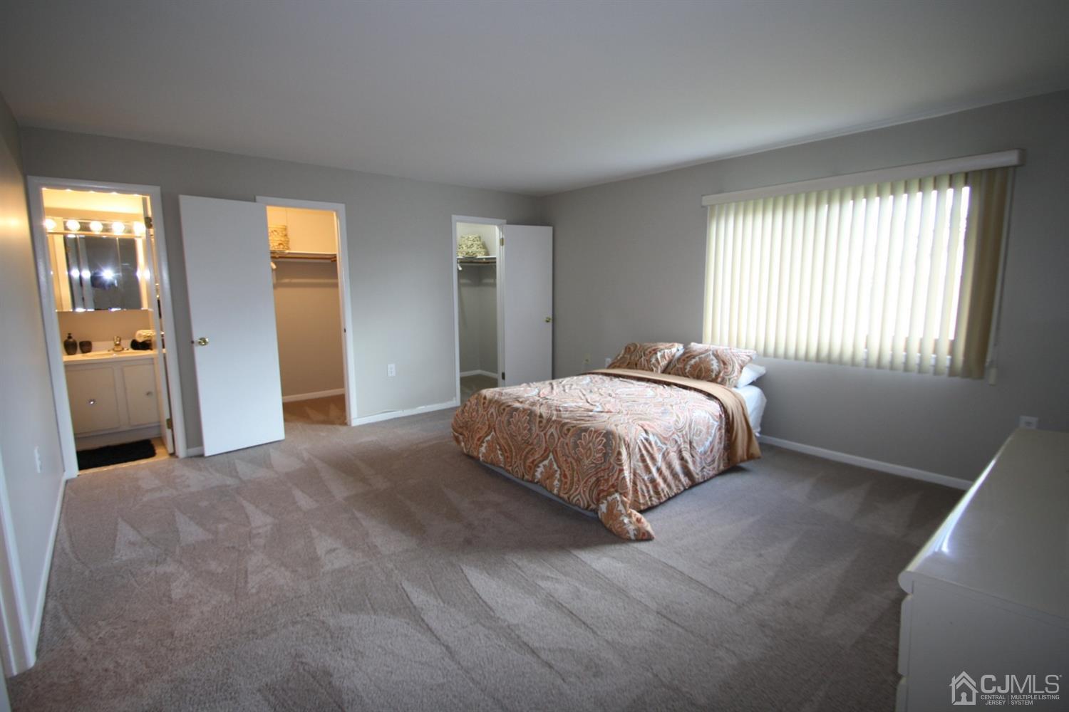 812 Robin Road Hillsborough, NJ 08844 - Photo 10 of 23 a bedroom with a bed and window