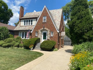 258 Southcote Road Riverside, IL 60546 - Photo 1 of 31 a front view of a house with a yard