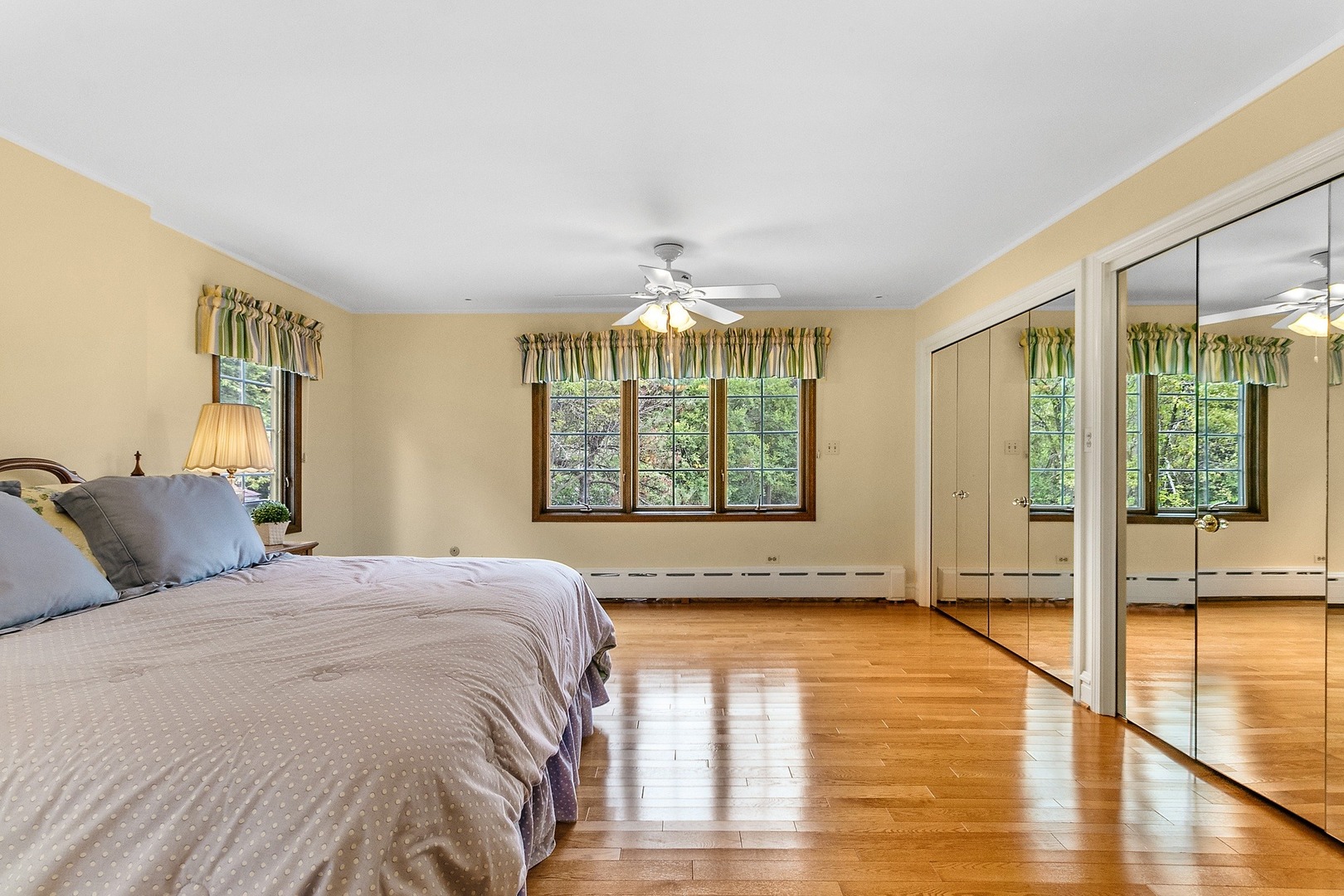 258 Southcote Road Riverside, IL 60546 - Photo 13 of 31 a spacious bedroom with a bed and a large window