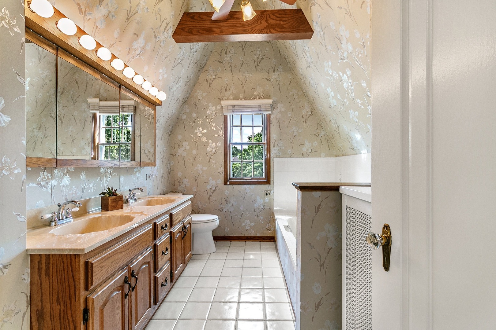 258 Southcote Road Riverside, IL 60546 - Photo 14 of 31 a bathroom with a sink and a mirror
