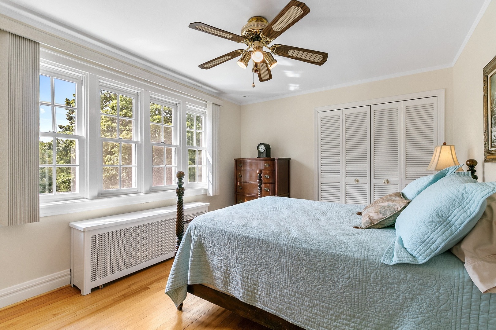 258 Southcote Road Riverside, IL 60546 - Photo 17 of 31 a bedroom with a bed and a large window with wooden floor