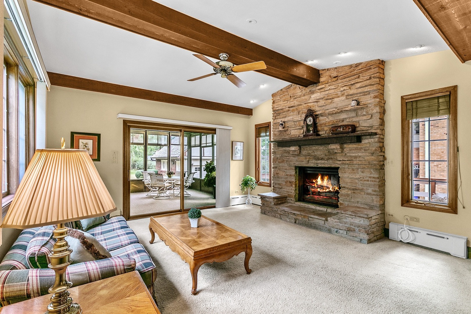 258 Southcote Road Riverside, IL 60546 - Photo 3 of 31 a living room with furniture and a fireplace