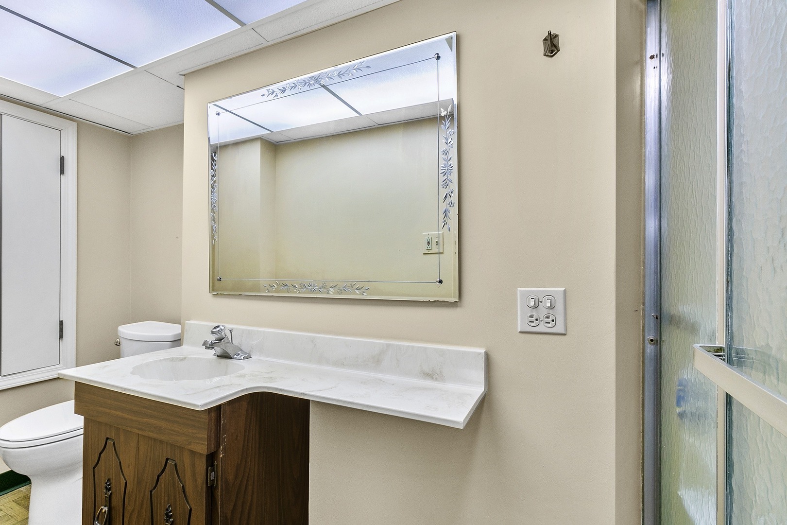 258 Southcote Road Riverside, IL 60546 - Photo 21 of 31 a bathroom with a sink and a mirror