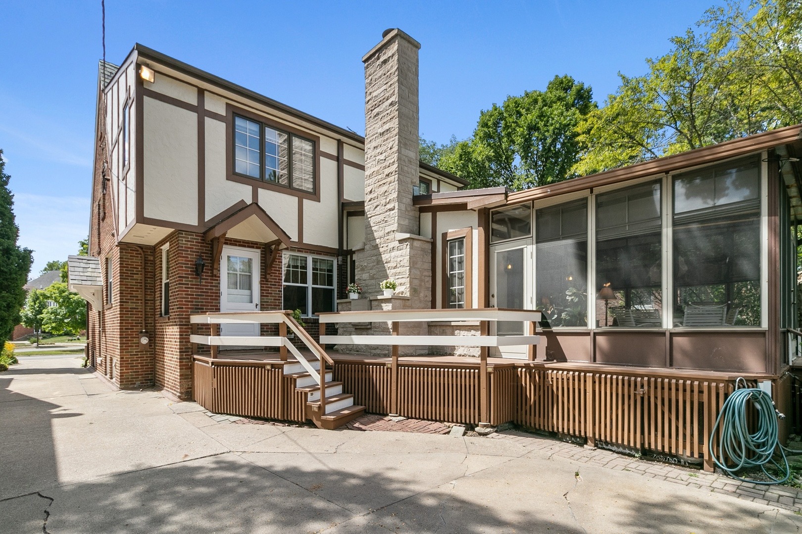 258 Southcote Road Riverside, IL 60546 - Photo 23 of 31 a view of a house with a backyard and a patio