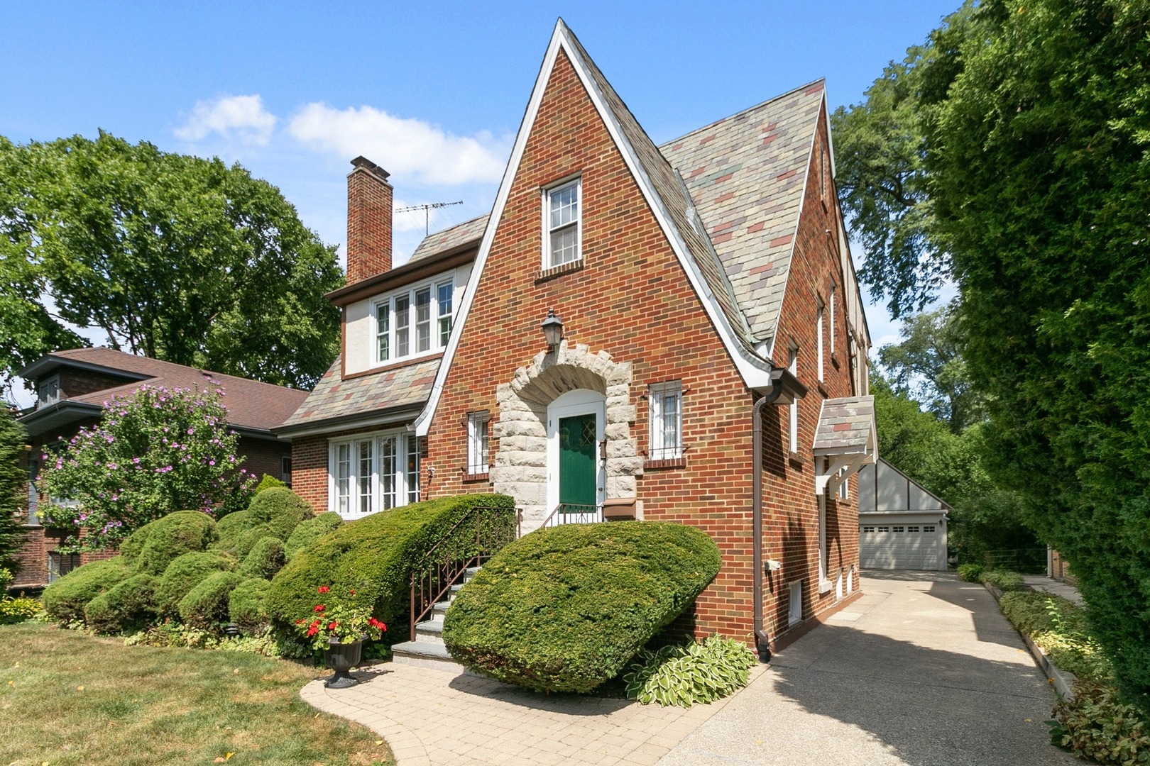 258 Southcote Road Riverside, IL 60546 - Photo 27 of 31 a front view of a house with a garden