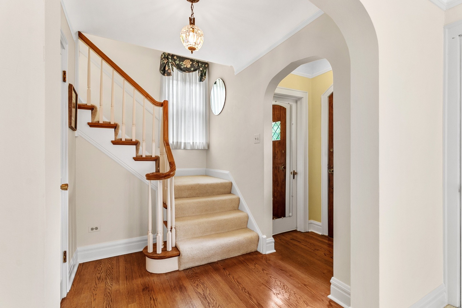 258 Southcote Road Riverside, IL 60546 - Photo 9 of 31 a view of entryway and hall with wooden floor