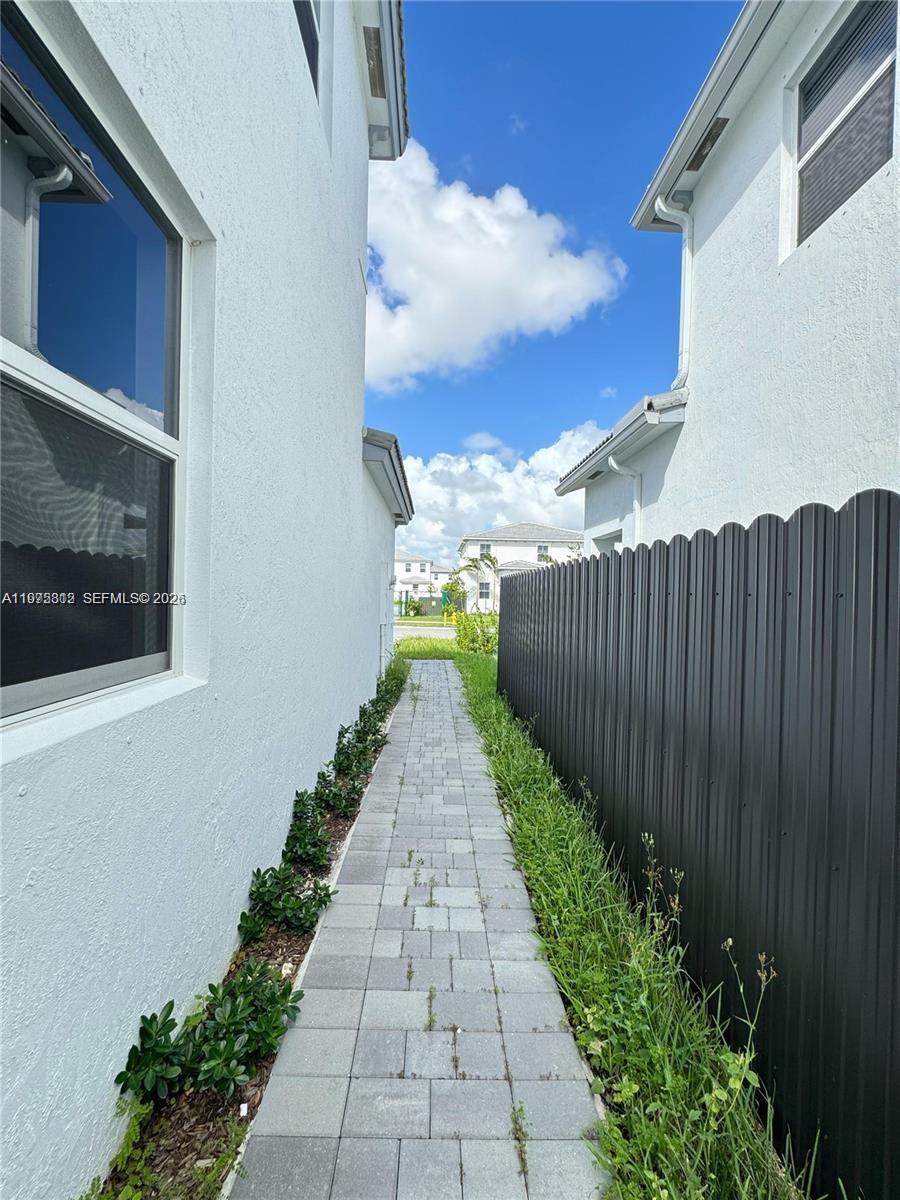 14894 Southwest 163rd Street Miami, FL 33157 - Photo 15 of 15 a view of a pathway with a pathway