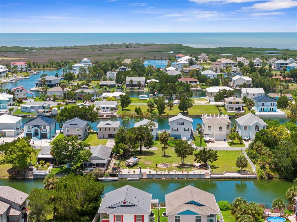 0 Sea Grape Drive, Unit LOTS 19 AND 20 Hernando Beach, FL 34607 - Photo 12 of 17 an aerial view of ocean and residential houses with outdoor space