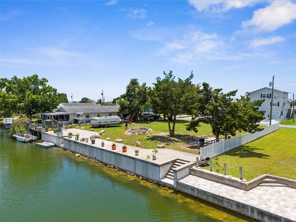 0 Sea Grape Drive, Unit LOTS 19 AND 20 Hernando Beach, FL 34607 - Photo 14 of 17 an aerial view of a house with a swimming pool