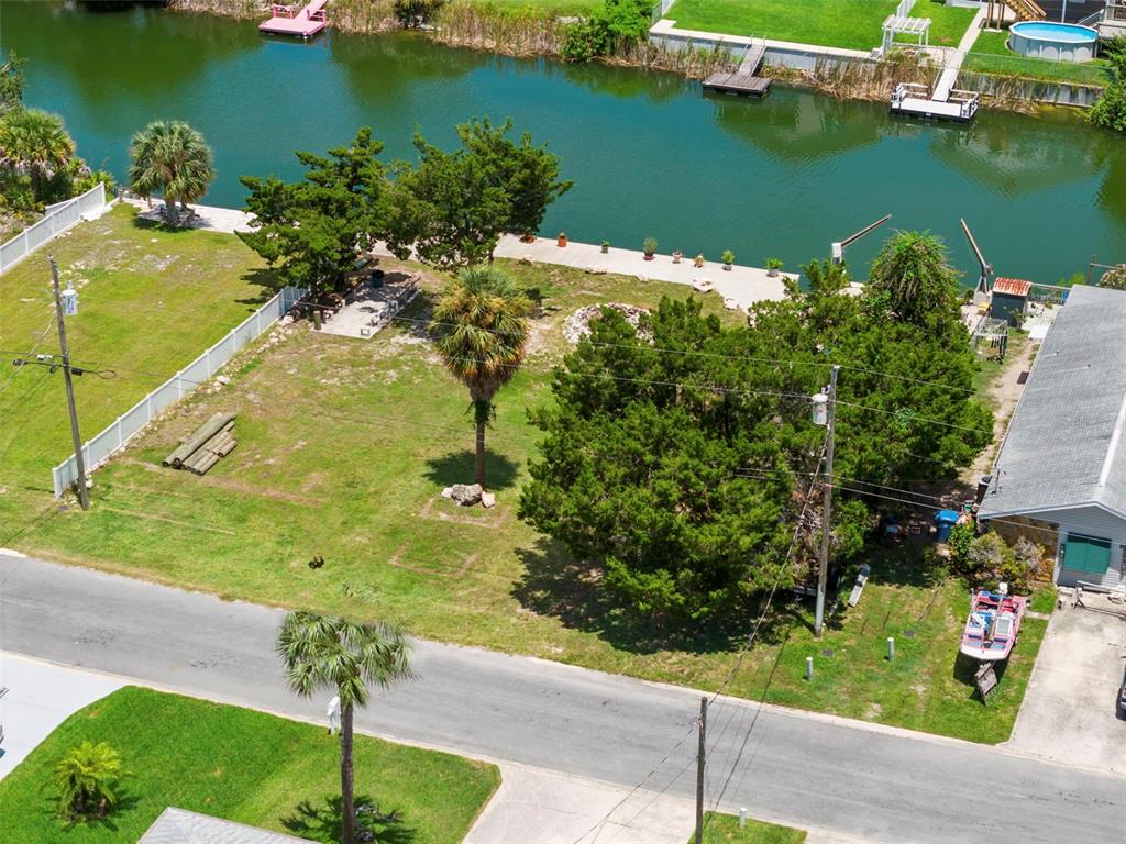 0 Sea Grape Drive, Unit LOTS 19 AND 20 Hernando Beach, FL 34607 - Photo 4 of 17 an aerial view of a residential houses with outdoor space and lake view