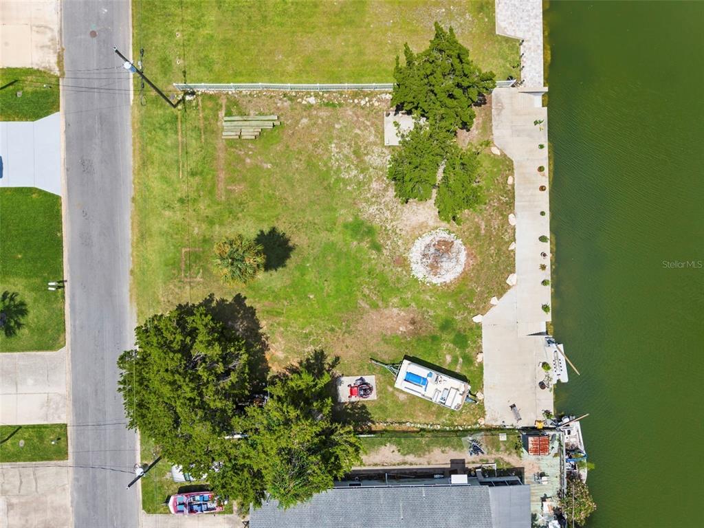 0 Sea Grape Drive, Unit LOTS 19 AND 20 Hernando Beach, FL 34607 - Photo 5 of 17 an aerial view of a residential houses with outdoor space