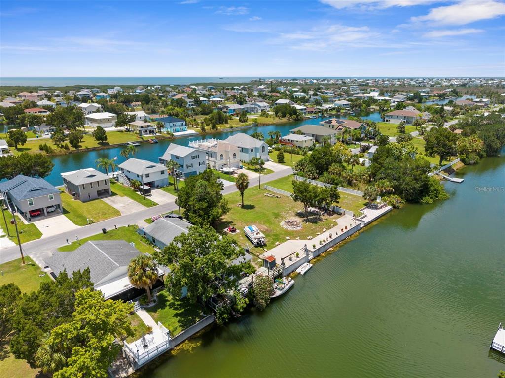 0 Sea Grape Drive, Unit LOTS 19 AND 20 Hernando Beach, FL 34607 - Photo 7 of 17 an aerial view of residential houses with outdoor space
