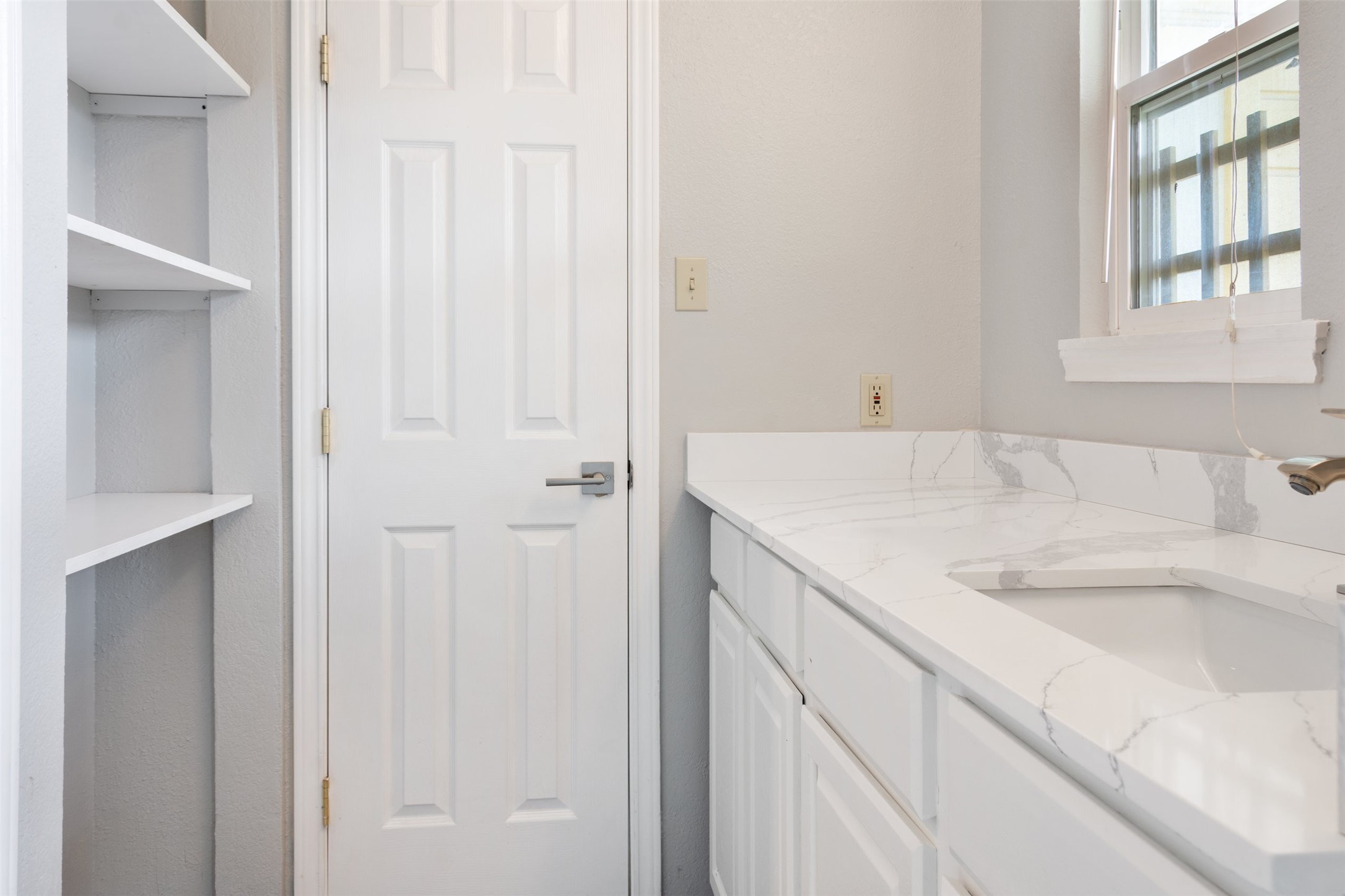5303 Indio Cove, Unit A Austin, TX 78745 - Photo 11 of 15 a bathroom with a sink and a bathtub