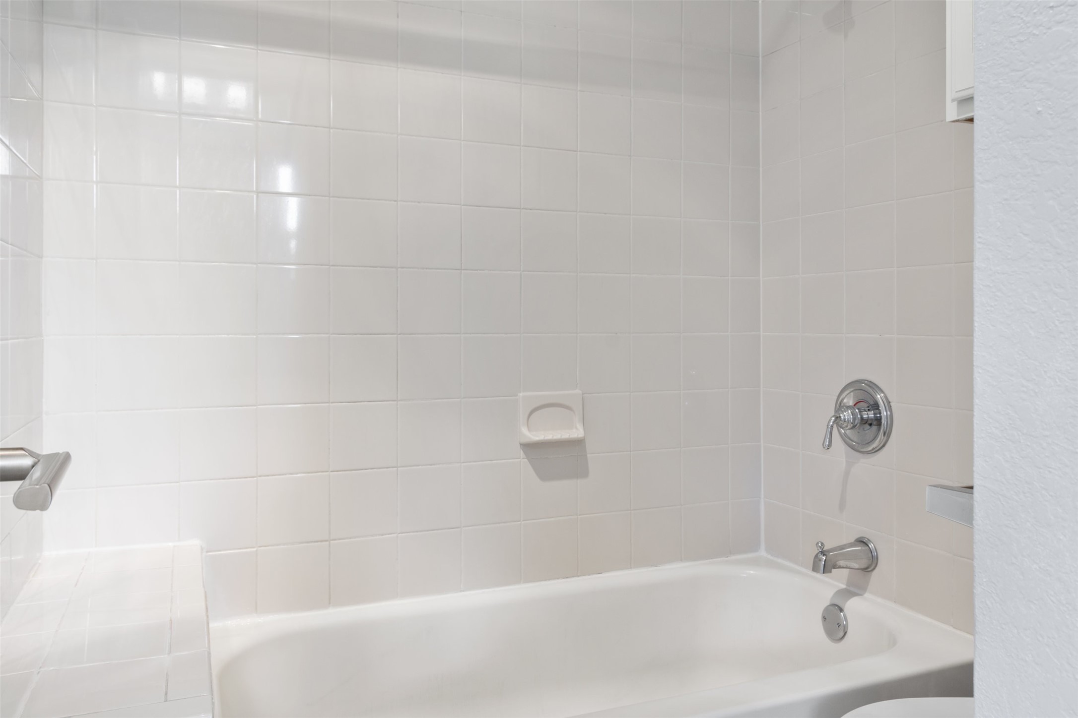 5303 Indio Cove, Unit A Austin, TX 78745 - Photo 12 of 15 a bathroom with a bathtub