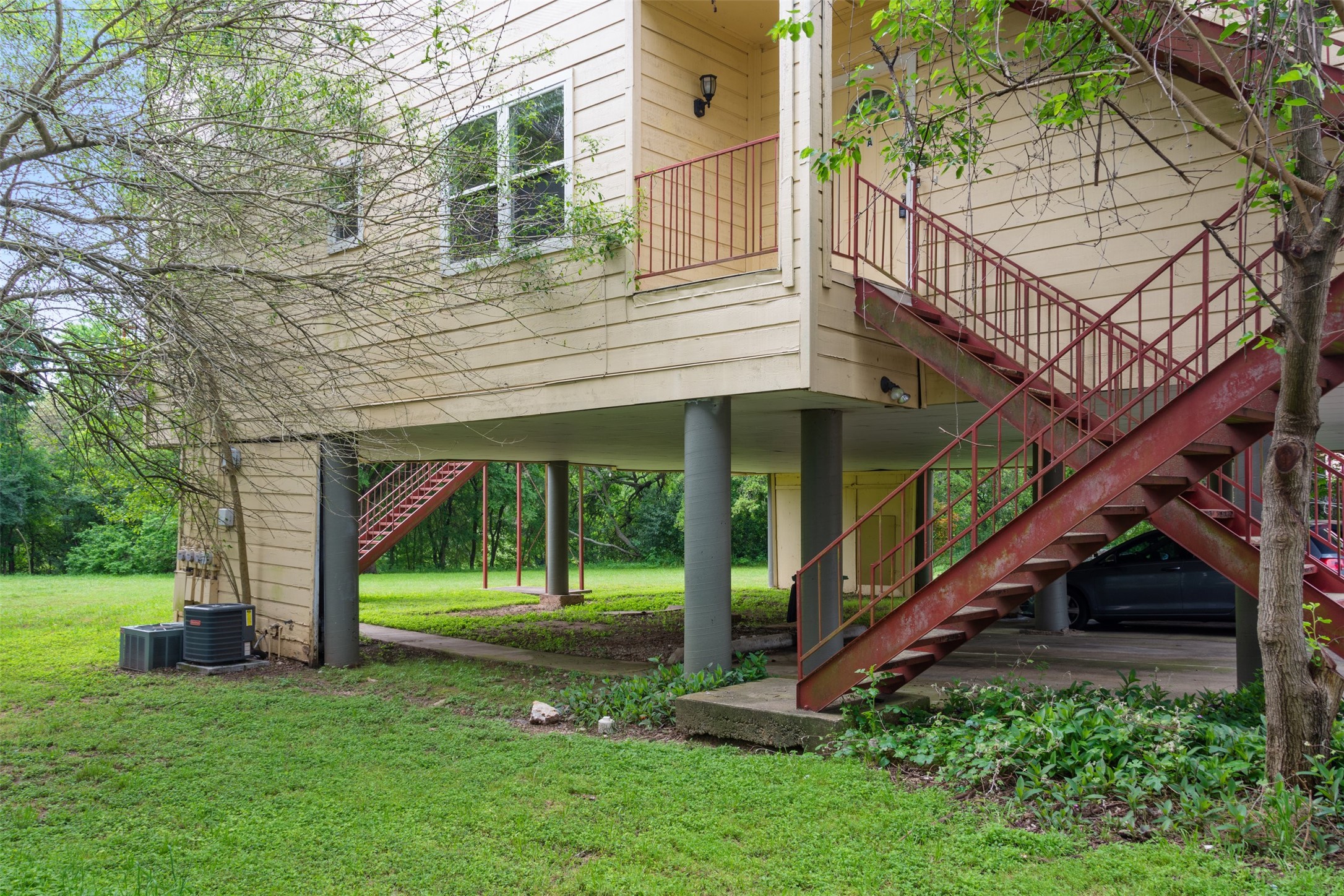 5303 Indio Cove, Unit A Austin, TX 78745 - Photo 2 of 15 a view of a house with a yard
