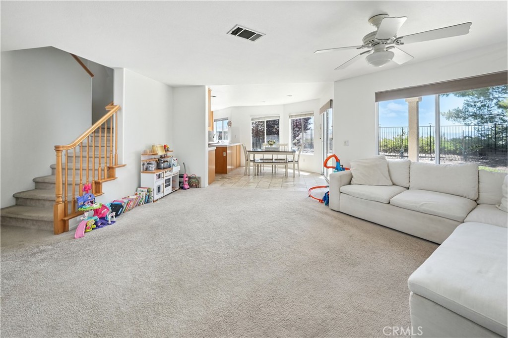 32610 Ridge Top Lane Castaic, CA 91384 - Photo 13 of 47 a living room with furniture and windows