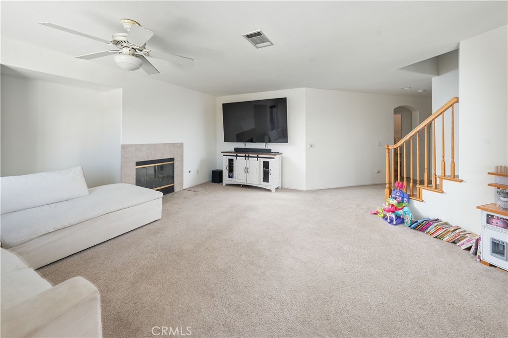 32610 Ridge Top Lane Castaic, CA 91384 - Photo 14 of 47 a living room with furniture and a flat screen tv