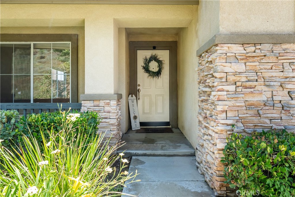 32610 Ridge Top Lane Castaic, CA 91384 - Photo 2 of 47 front view of a house with a outdoor space