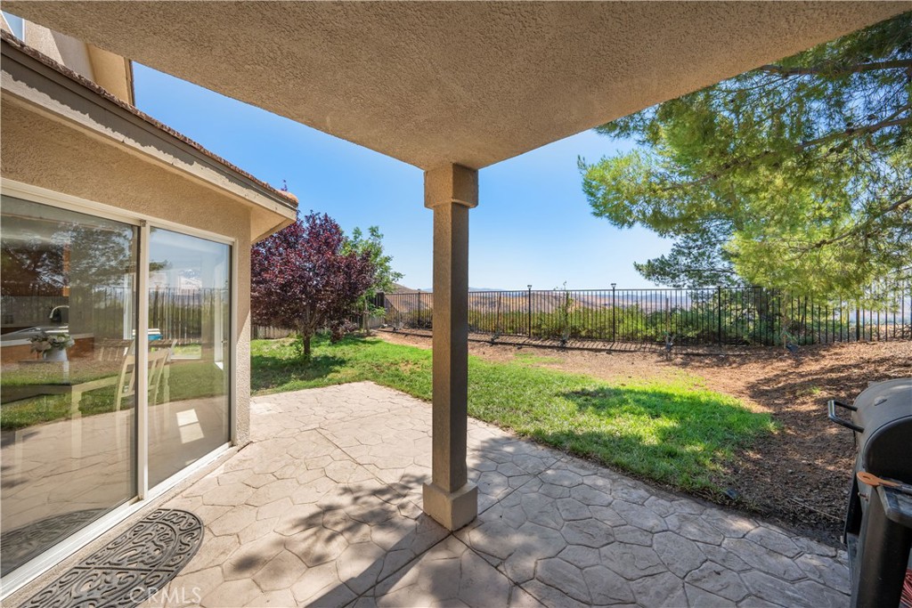 32610 Ridge Top Lane Castaic, CA 91384 - Photo 23 of 47 a view of a porch with a yard