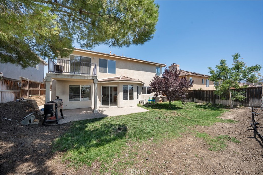 32610 Ridge Top Lane Castaic, CA 91384 - Photo 24 of 47 a front view of house with yard and green space