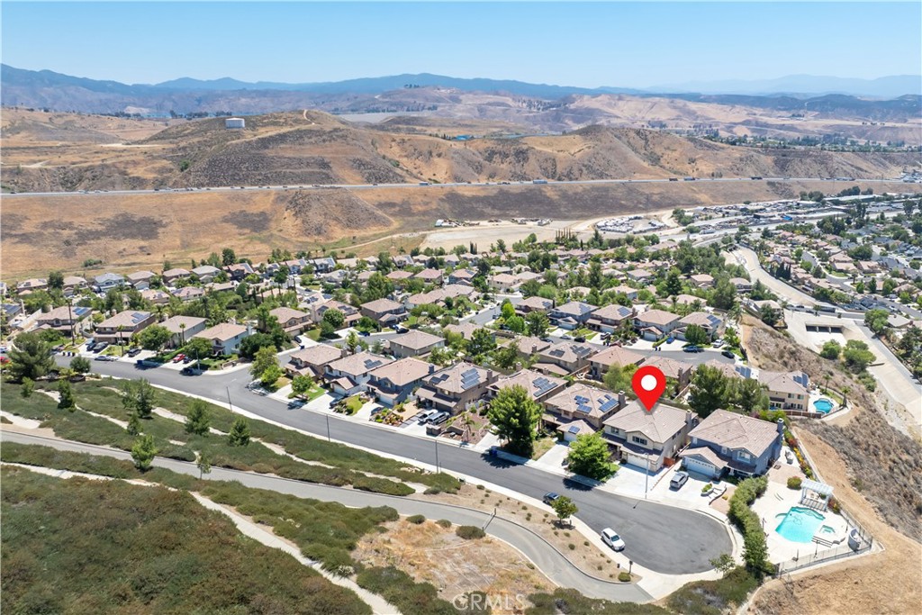 32610 Ridge Top Lane Castaic, CA 91384 - Photo 4 of 47 an aerial view of residential houses with outdoor space