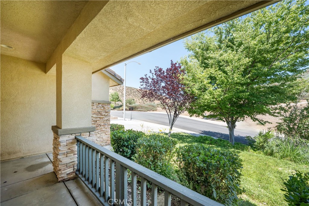 32610 Ridge Top Lane Castaic, CA 91384 - Photo 7 of 47 a view of a pathway of a building from a balcony