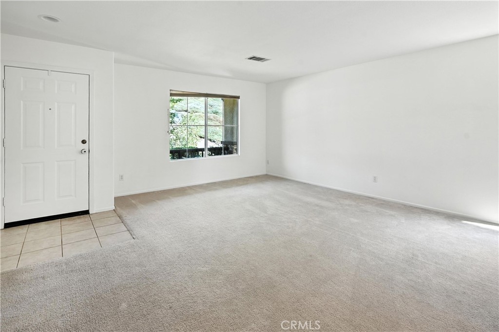 32610 Ridge Top Lane Castaic, CA 91384 - Photo 8 of 47 a view of an empty room with a window
