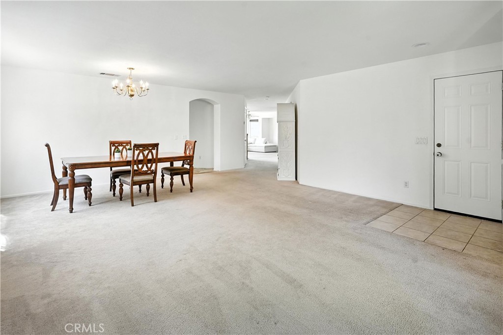 32610 Ridge Top Lane Castaic, CA 91384 - Photo 9 of 47 a view of a livingroom with furniture and chandelier
