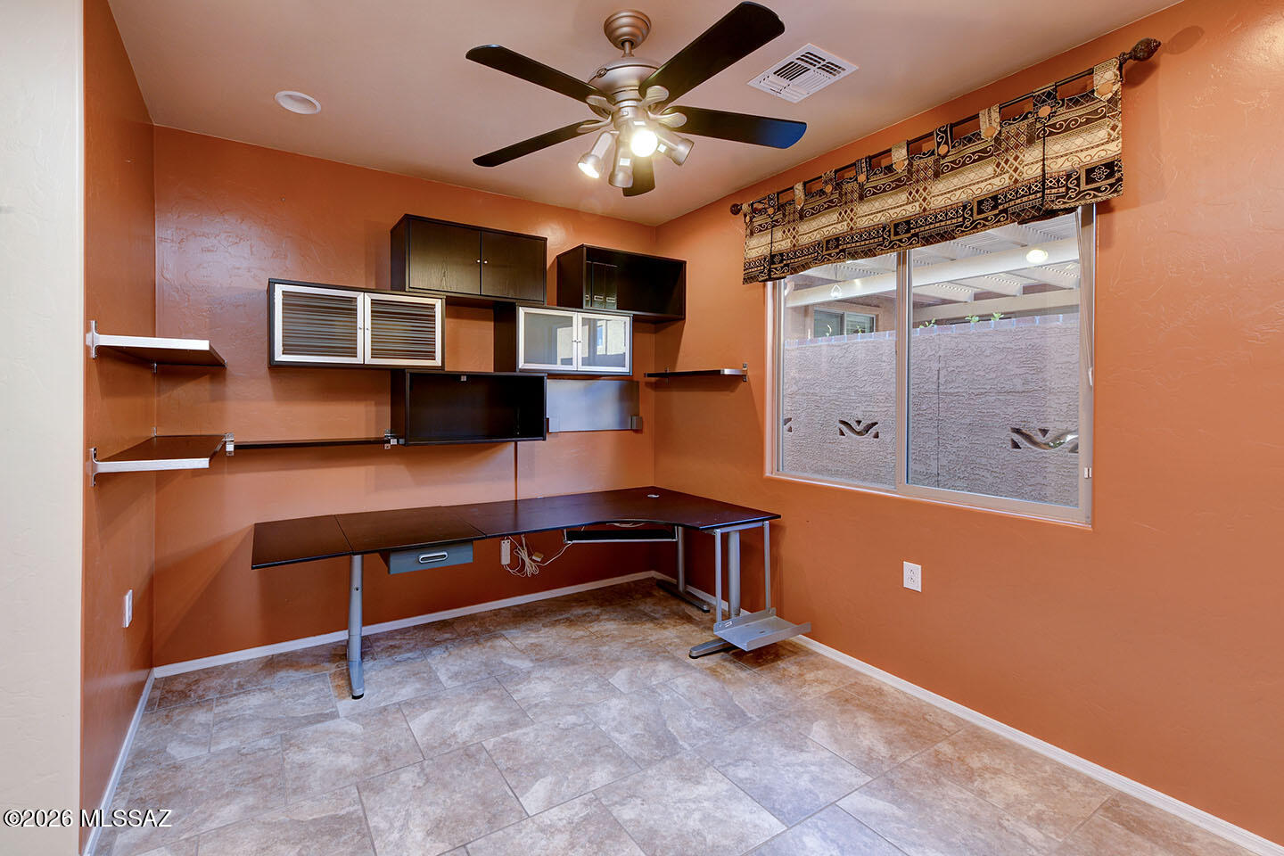 13991 East Cheavront Loop Vail, AZ 85641 - Photo 14 of 47 an empty room with windows