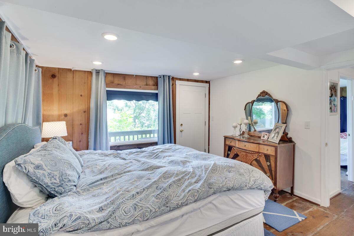 2144 Cedar Road Port Republic, MD 20676 - Photo 43 of 56 a bedroom with a bed and a window