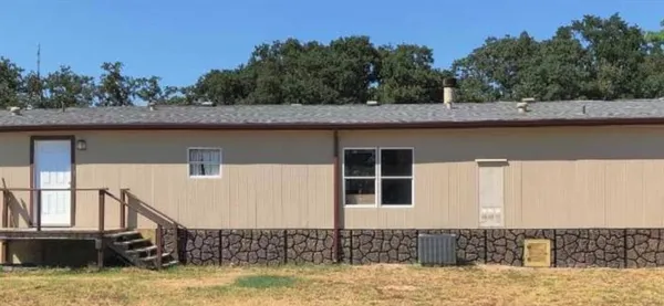 a view of a house with roof deck