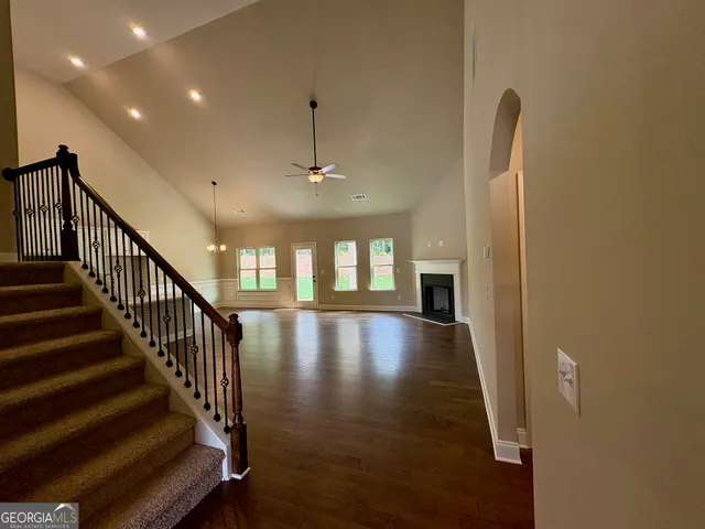 an entryway in a hall with a window