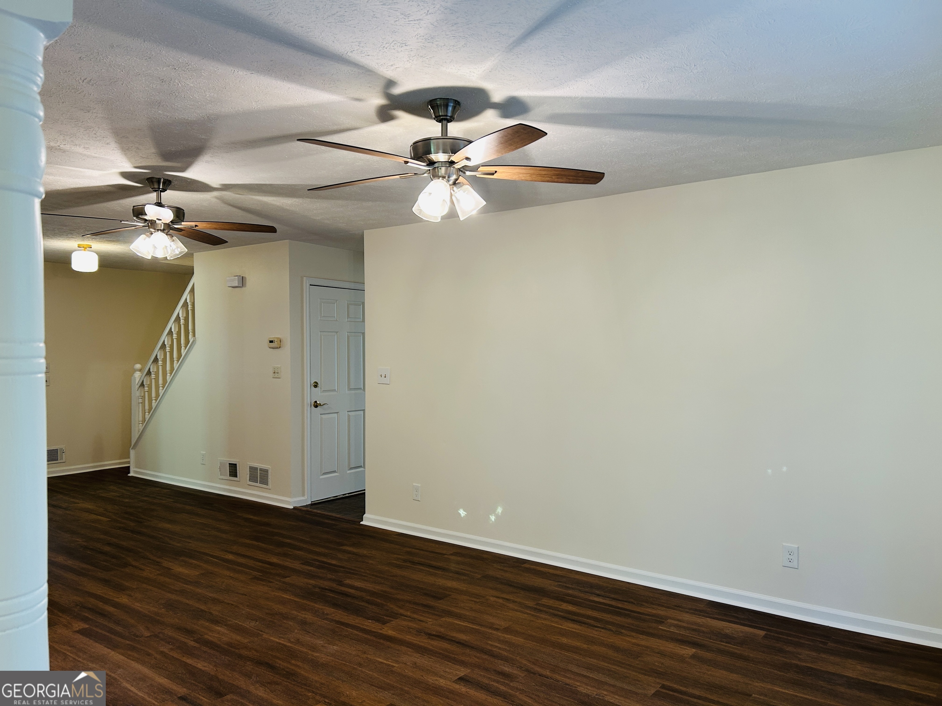 2131 Perrin Drive Lawrenceville, GA 30043 - Photo 11 of 60 a view of a room with wooden floor