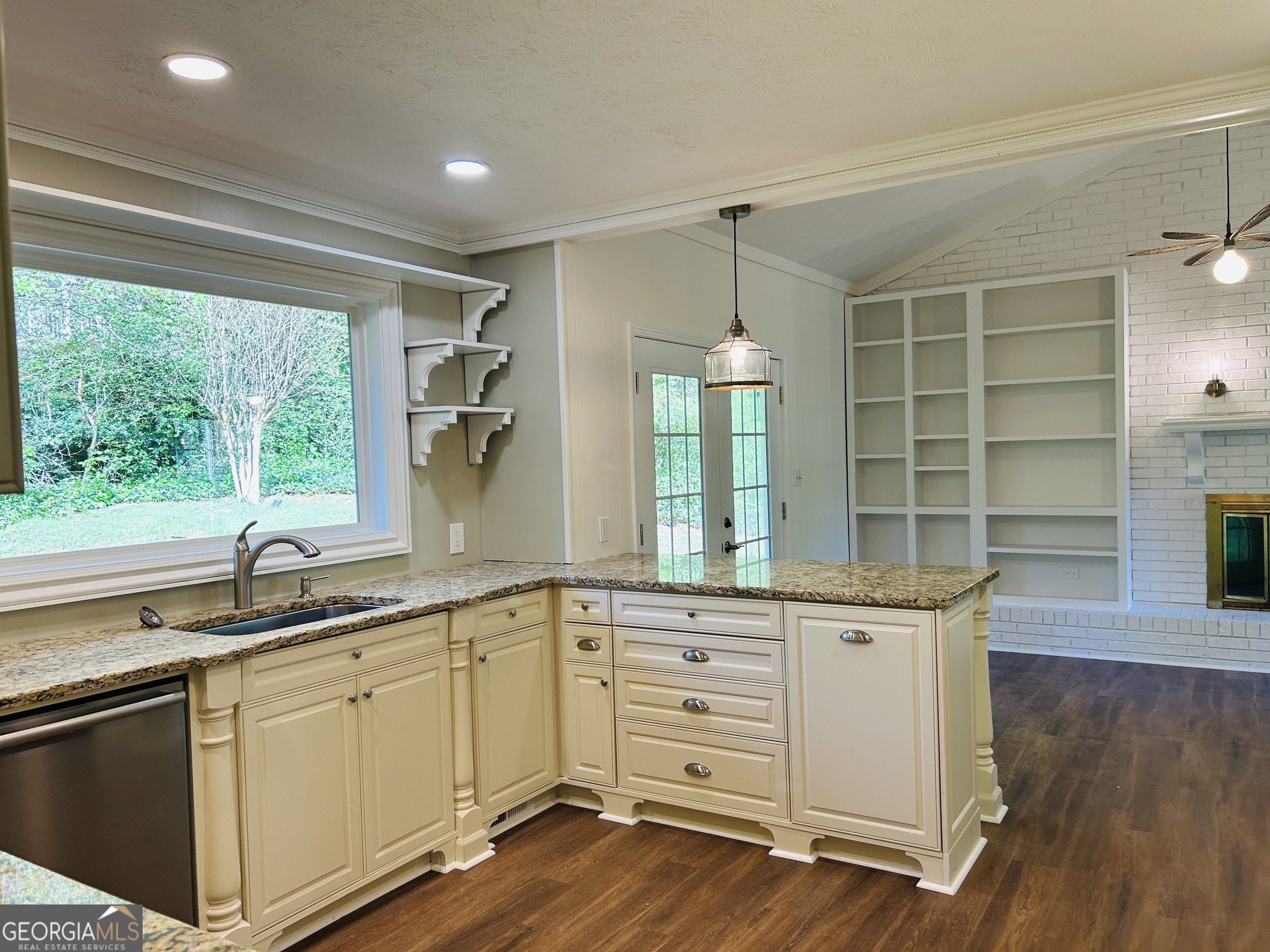 2131 Perrin Drive Lawrenceville, GA 30043 - Photo 16 of 60 a kitchen with a sink window and cabinets