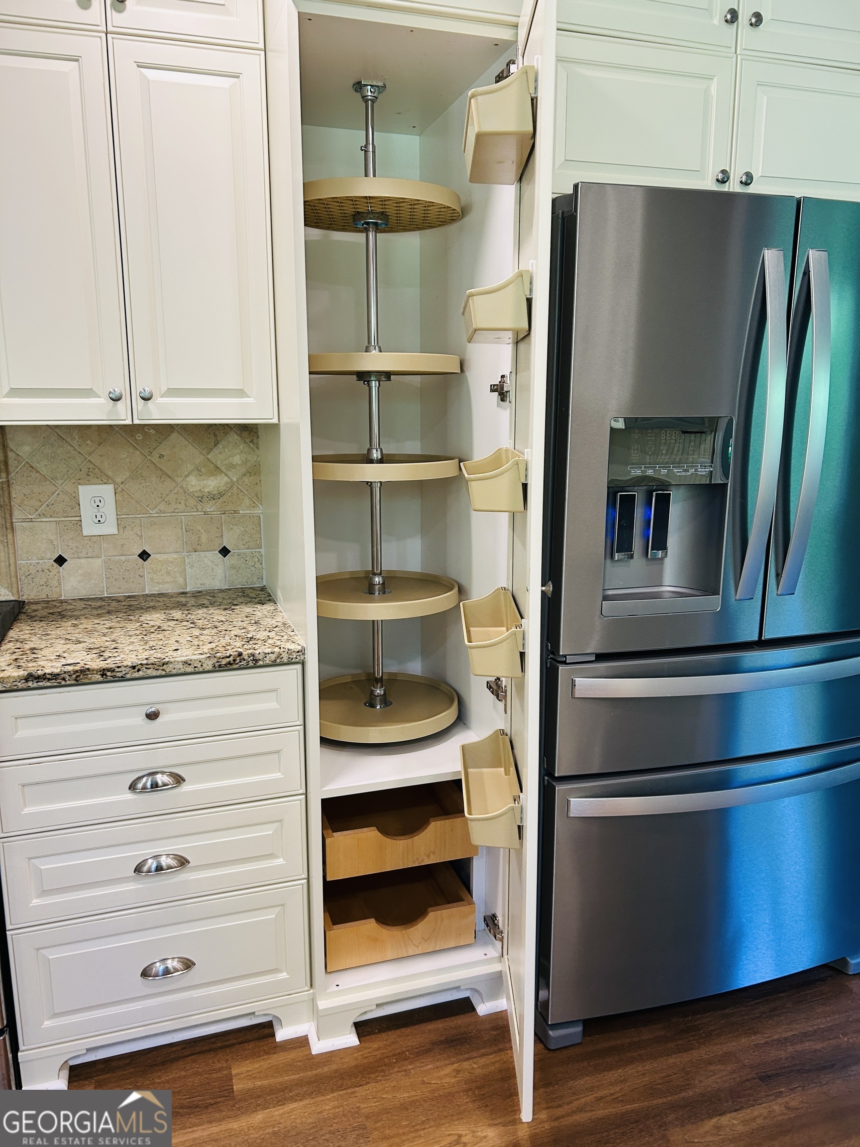 2131 Perrin Drive Lawrenceville, GA 30043 - Photo 18 of 60 a kitchen with appliances and cabinets