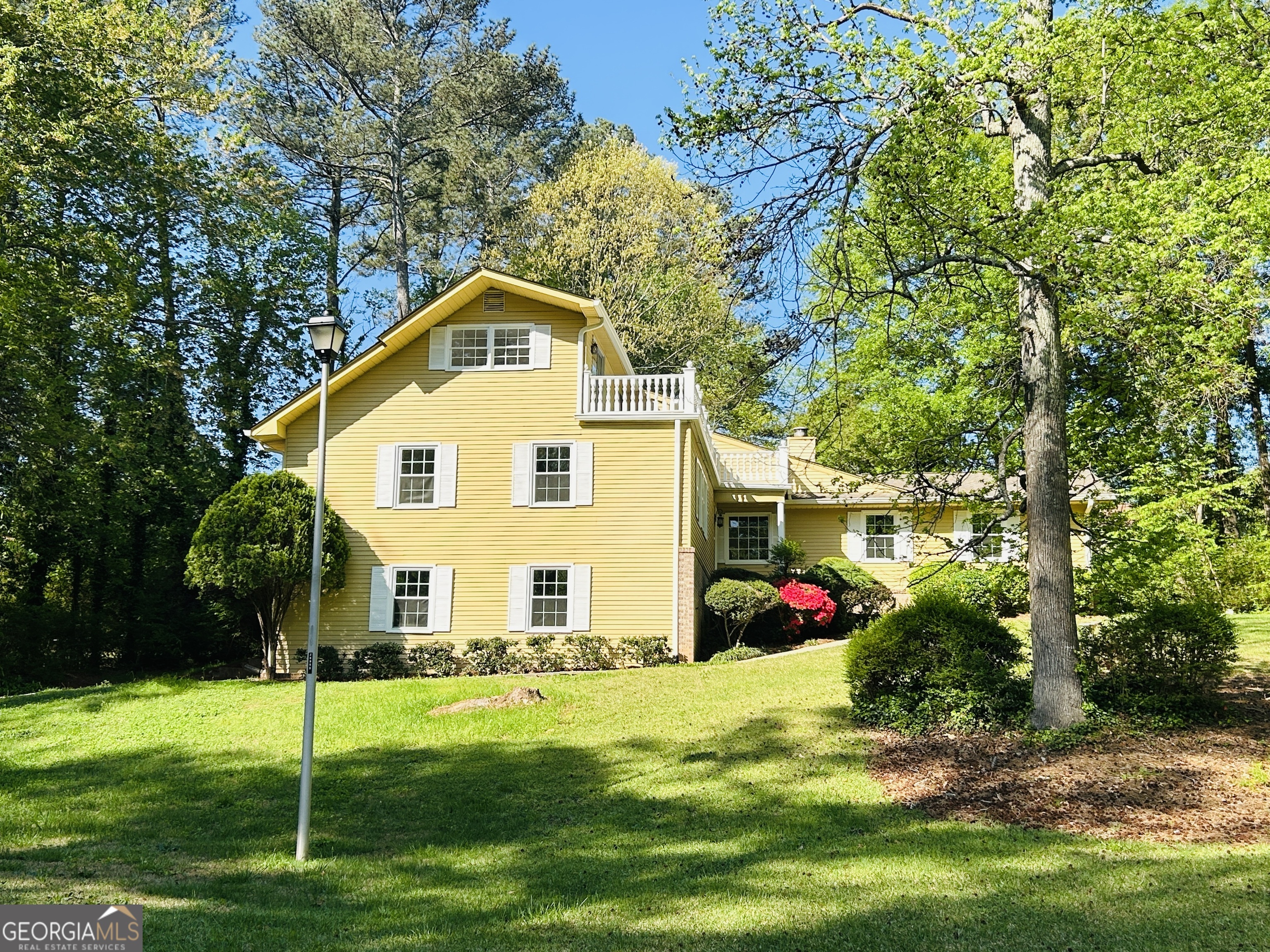 2131 Perrin Drive Lawrenceville, GA 30043 - Photo 2 of 60 a view of a house with a yard