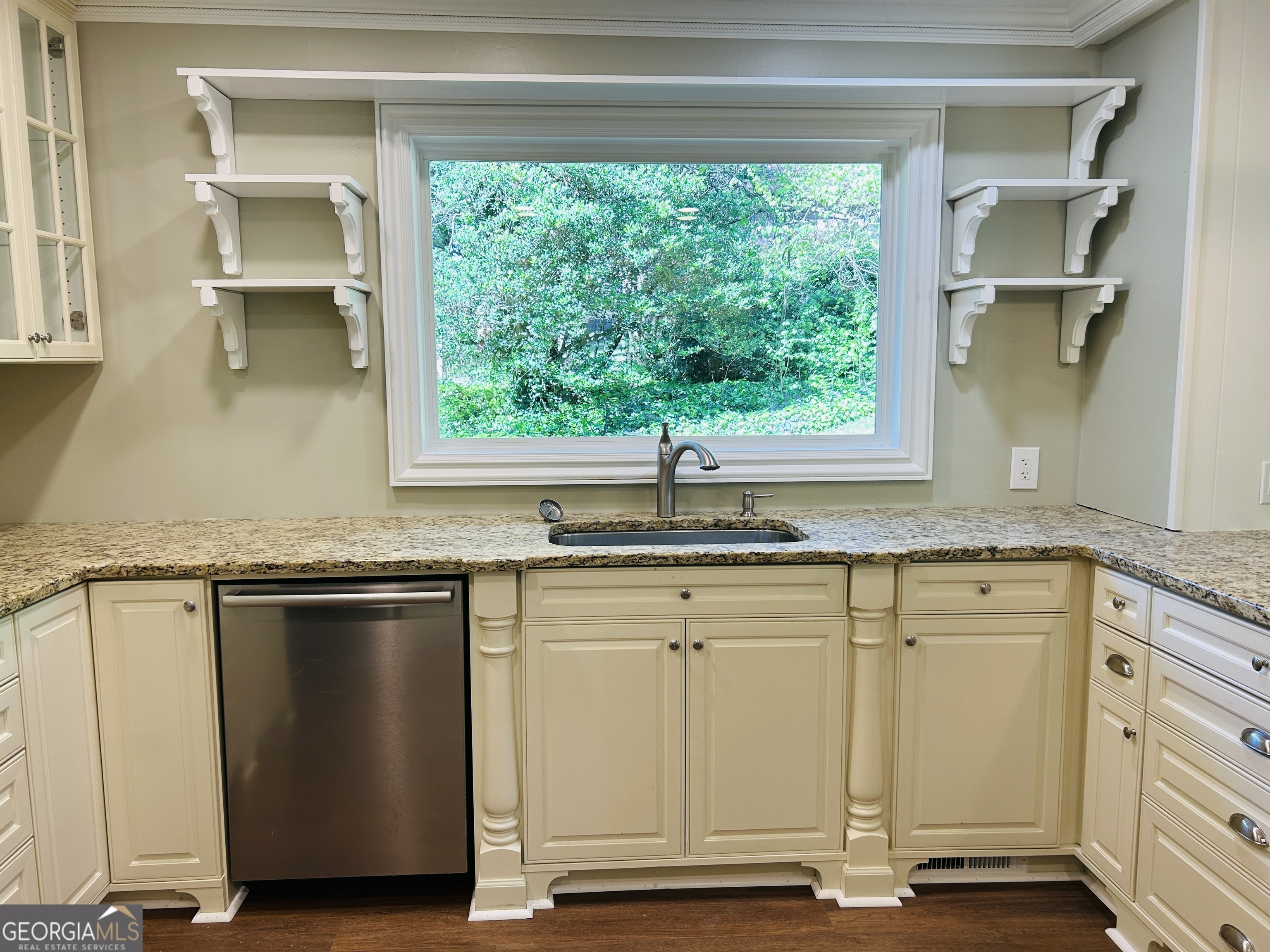 2131 Perrin Drive Lawrenceville, GA 30043 - Photo 21 of 60 a kitchen with granite countertop a window and a sink