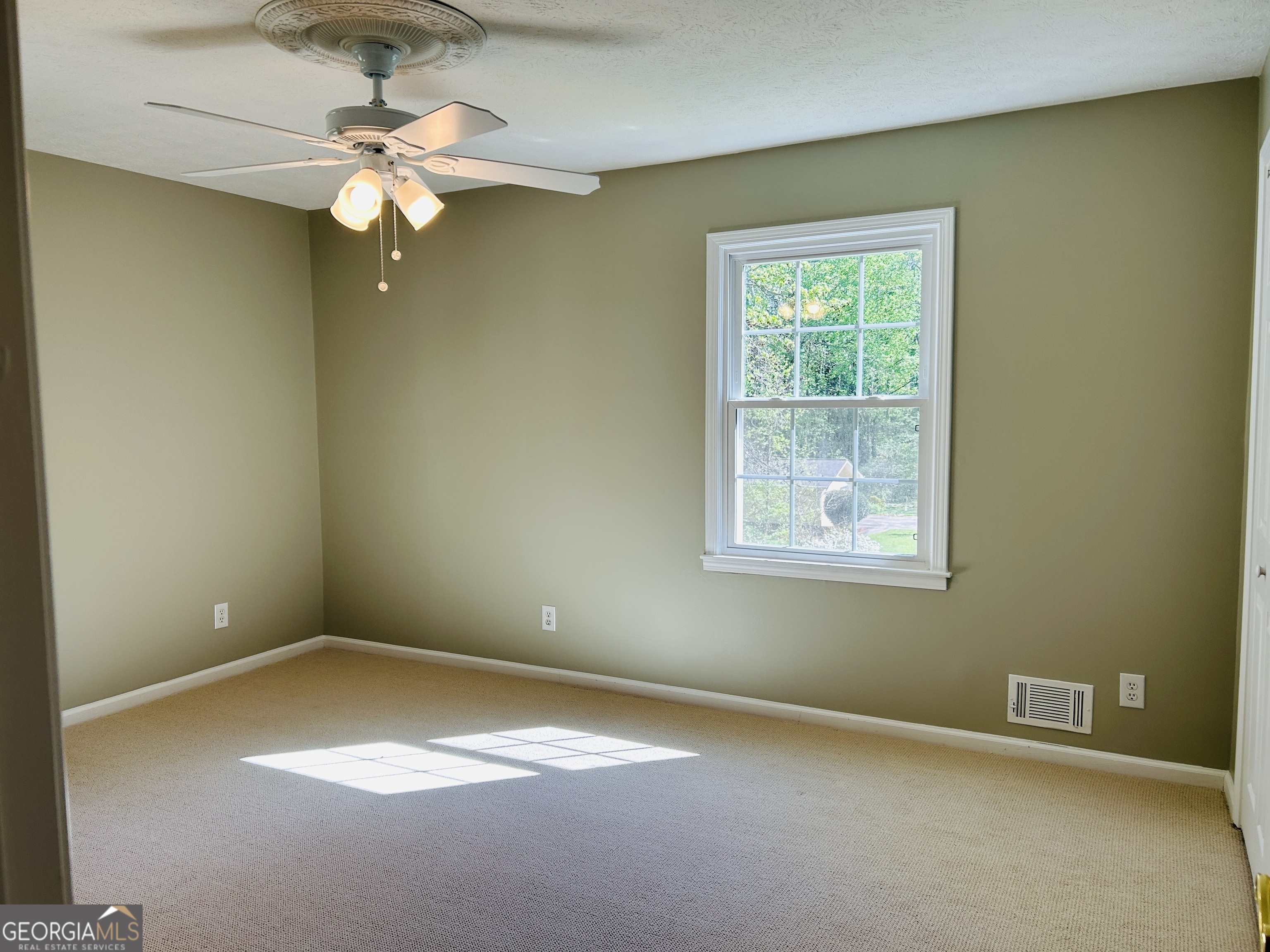 2131 Perrin Drive Lawrenceville, GA 30043 - Photo 42 of 60 an empty room with a window