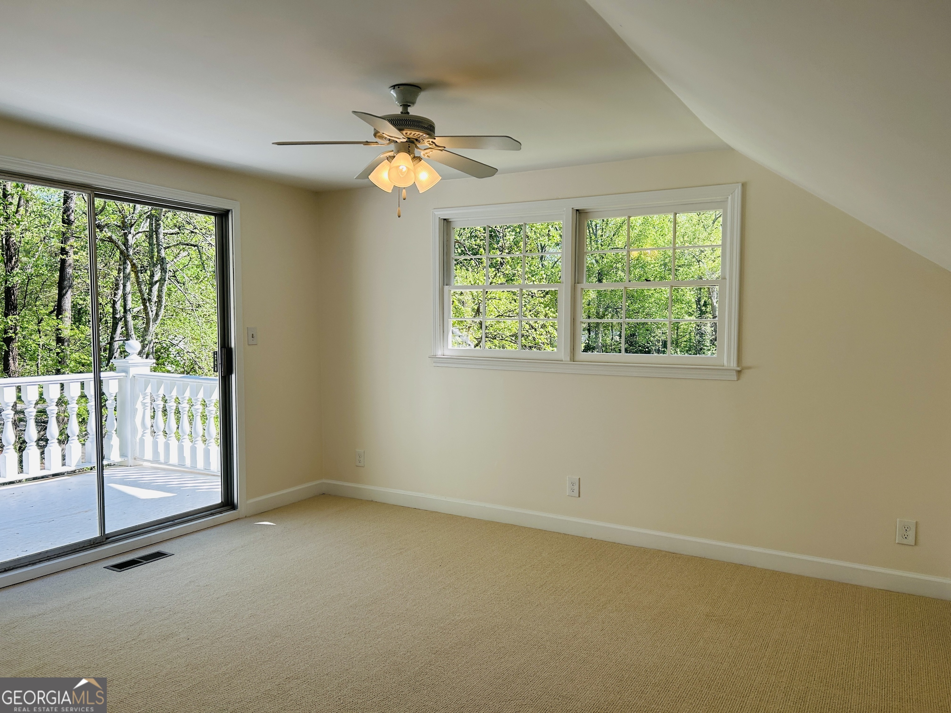 2131 Perrin Drive Lawrenceville, GA 30043 - Photo 47 of 60 a view of an empty room with a window